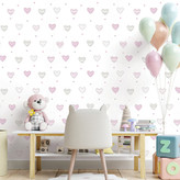 نمای نزدیک از کاغذ دیواری دخترانه با طرح قلب گرافیکی