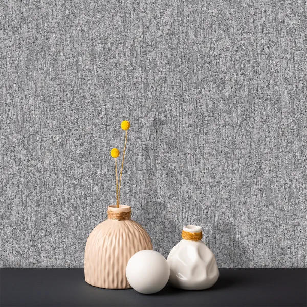 نمای نزدیک از کاغذدیواری طوسی بافتدار در دو مدل با رگههای درخشان طلایی و نقرهای و زمینه پتینه محو